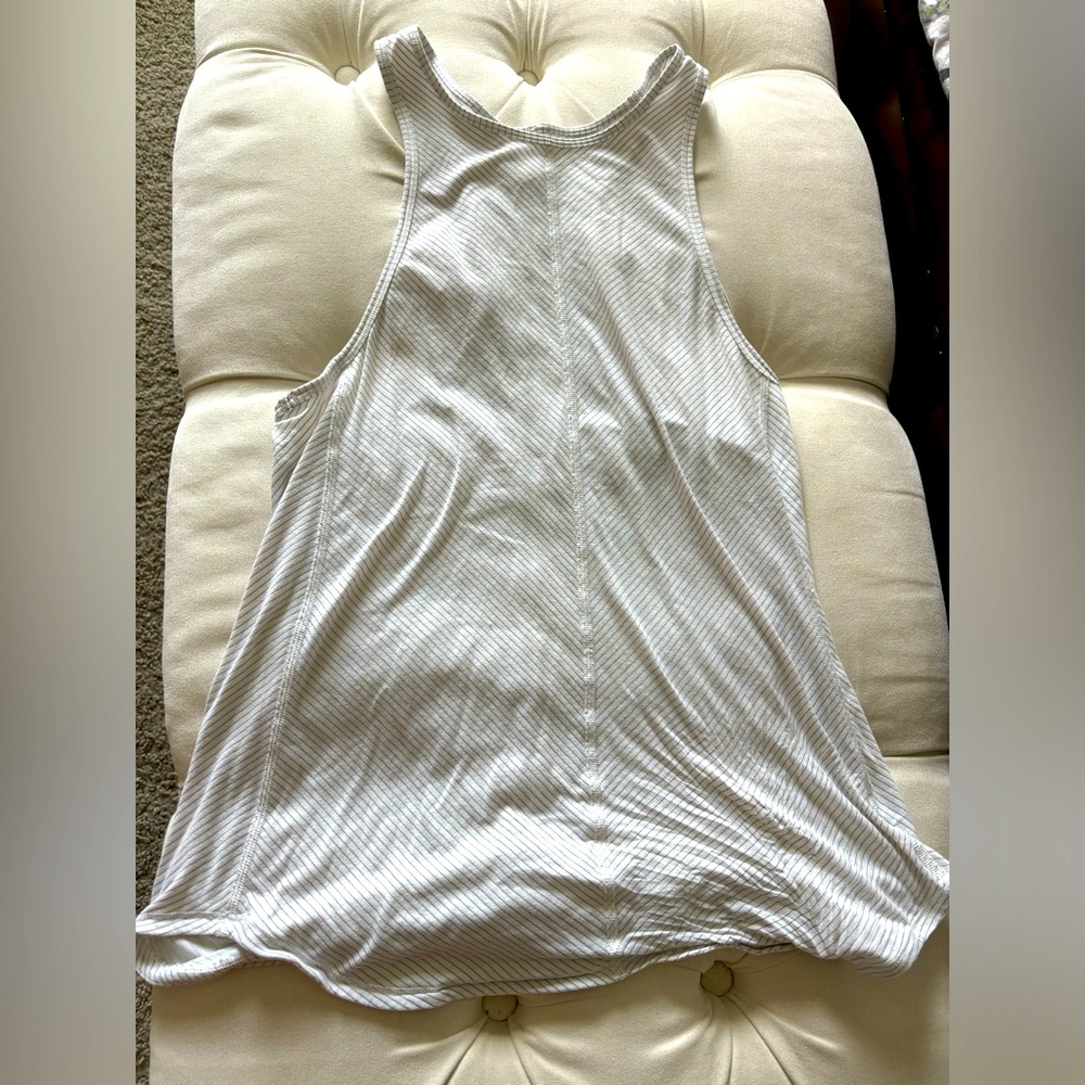 Lululemon flowy tank with olive green stripes.